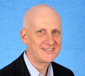 David E Williams, President of Health Business Group